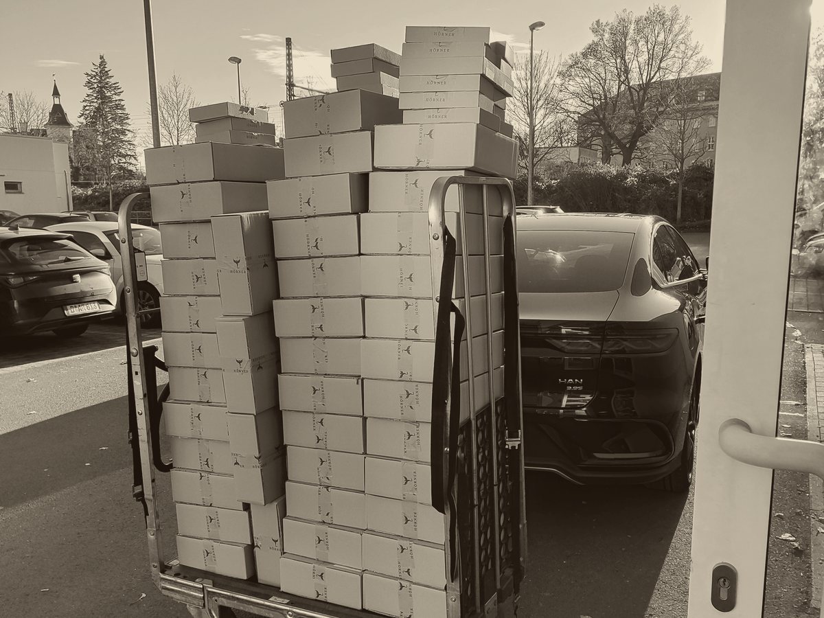 A cart stacked with Hörner shipping boxes in Dresden