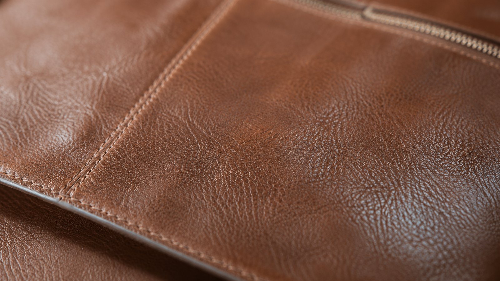 Thick cowhide leather, grain and saddle stitch